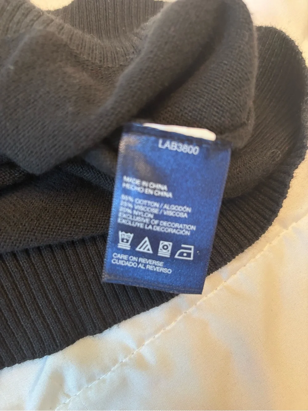 Tommy Hilfiger Men's Black V-Neck Sweater with Subtle Logo Trim